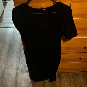 Woman’s black bodycon dress
